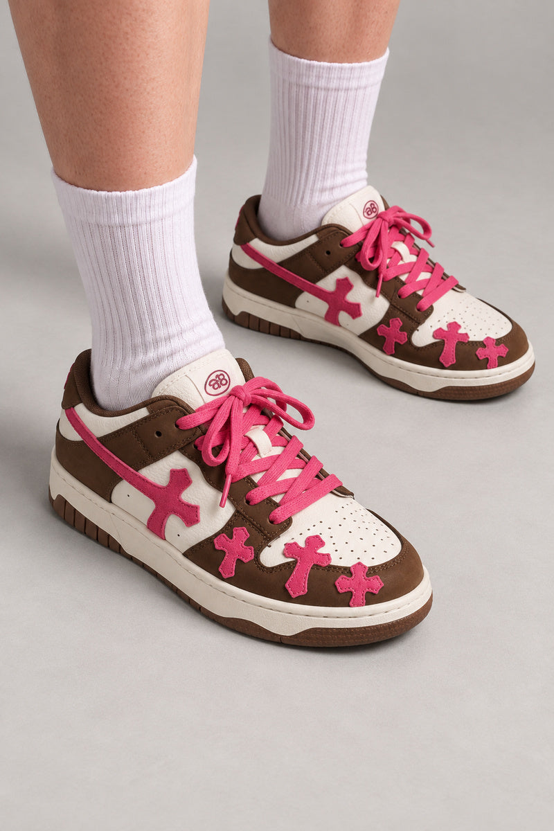 White Cross Patch Sneakers 'Jujika' – brown version with pink cross patches and pink laces, Japanese streetwear sneakers worn with white socks, on model