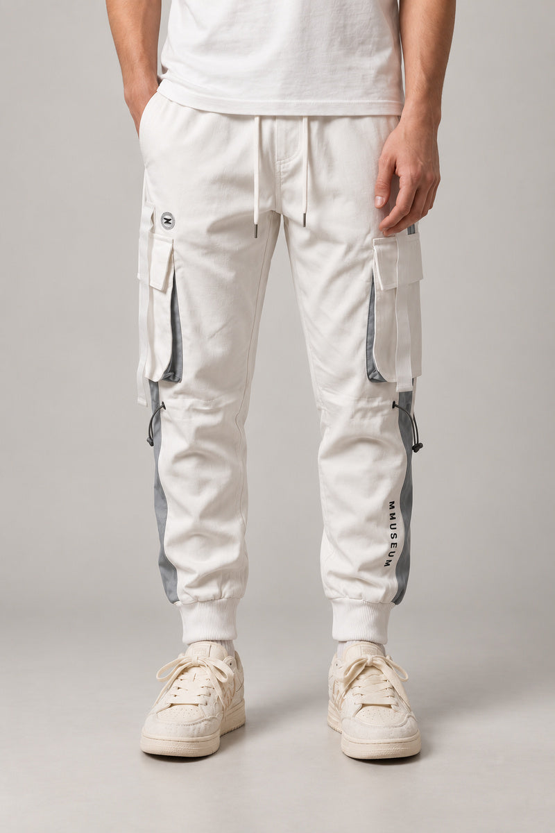 White Techwear Cargo Joggers 'Hakugin' – white techwear cargo joggers with multiple pockets and straps, Japanese streetwear pants, front view on model