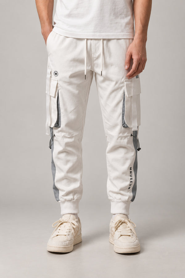 White Techwear Cargo Joggers 'Hakugin' – white techwear cargo joggers with multiple pockets and straps, Japanese streetwear pants, front view on model
