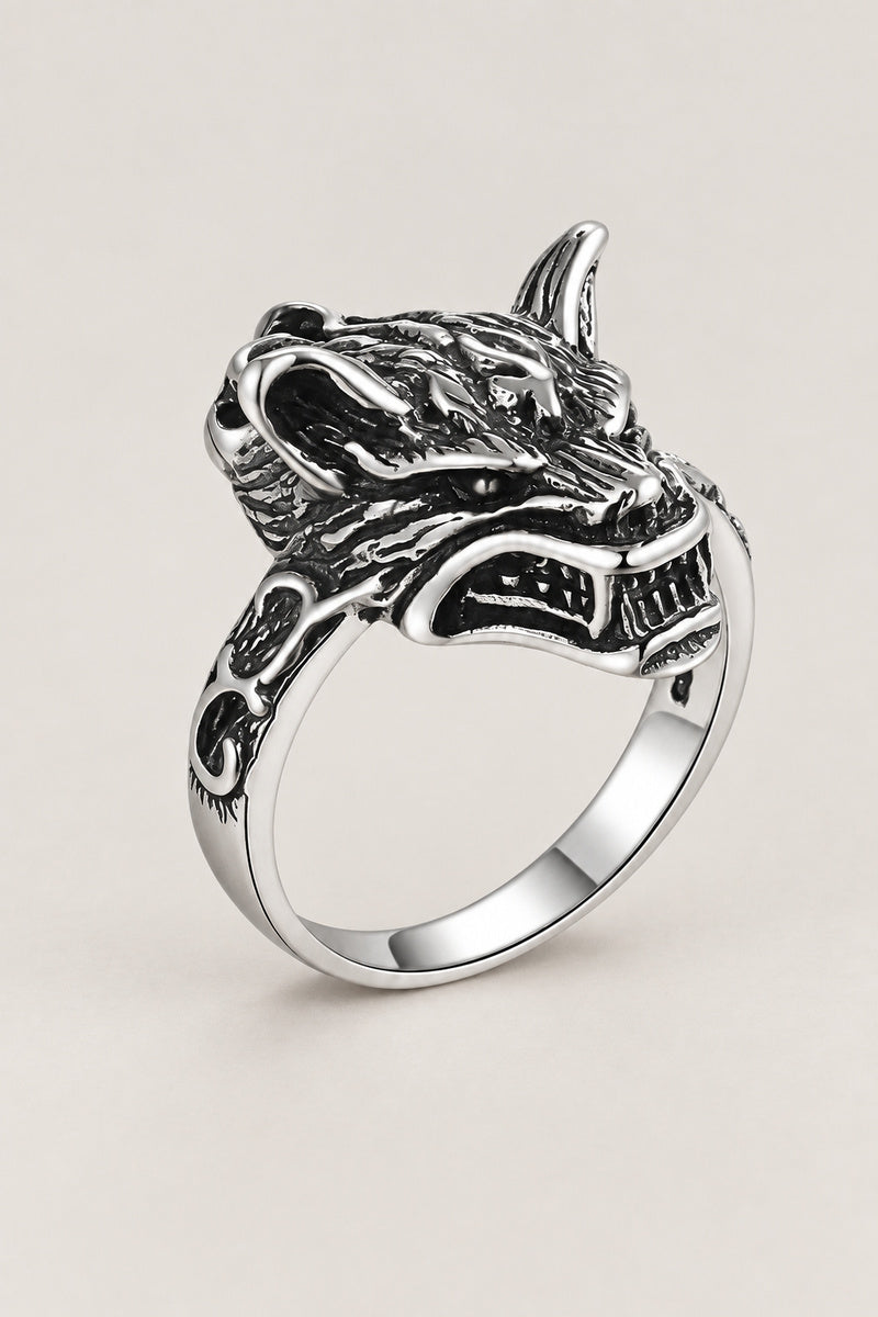 Wolf Head Ring 'Ookami' – sterling silver wolf head ring with bared teeth and ears back on carved band, Japanese okami wolf ring, studio view