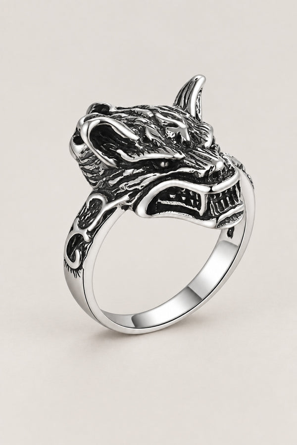 Wolf Head Ring 'Ookami' – sterling silver wolf head ring with bared teeth and ears back on carved band, Japanese okami wolf ring, studio view