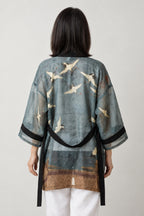 Women's Belted Kimono Robe 'Asagi' – back view of teal kimono robe showing flying cranes and gold landscape print