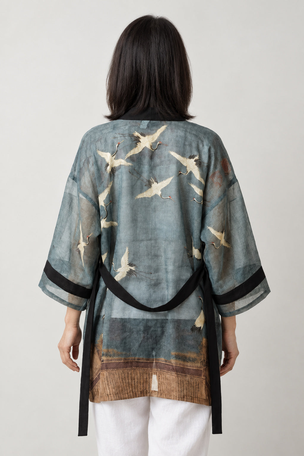 Women's Belted Kimono Robe 'Asagi' – back view of teal kimono robe showing flying cranes and gold landscape print