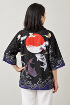 Women's Koi Kimono Jacket 'Murasaki' – back view of black kimono jacket showing koi fish swimming under a red sun