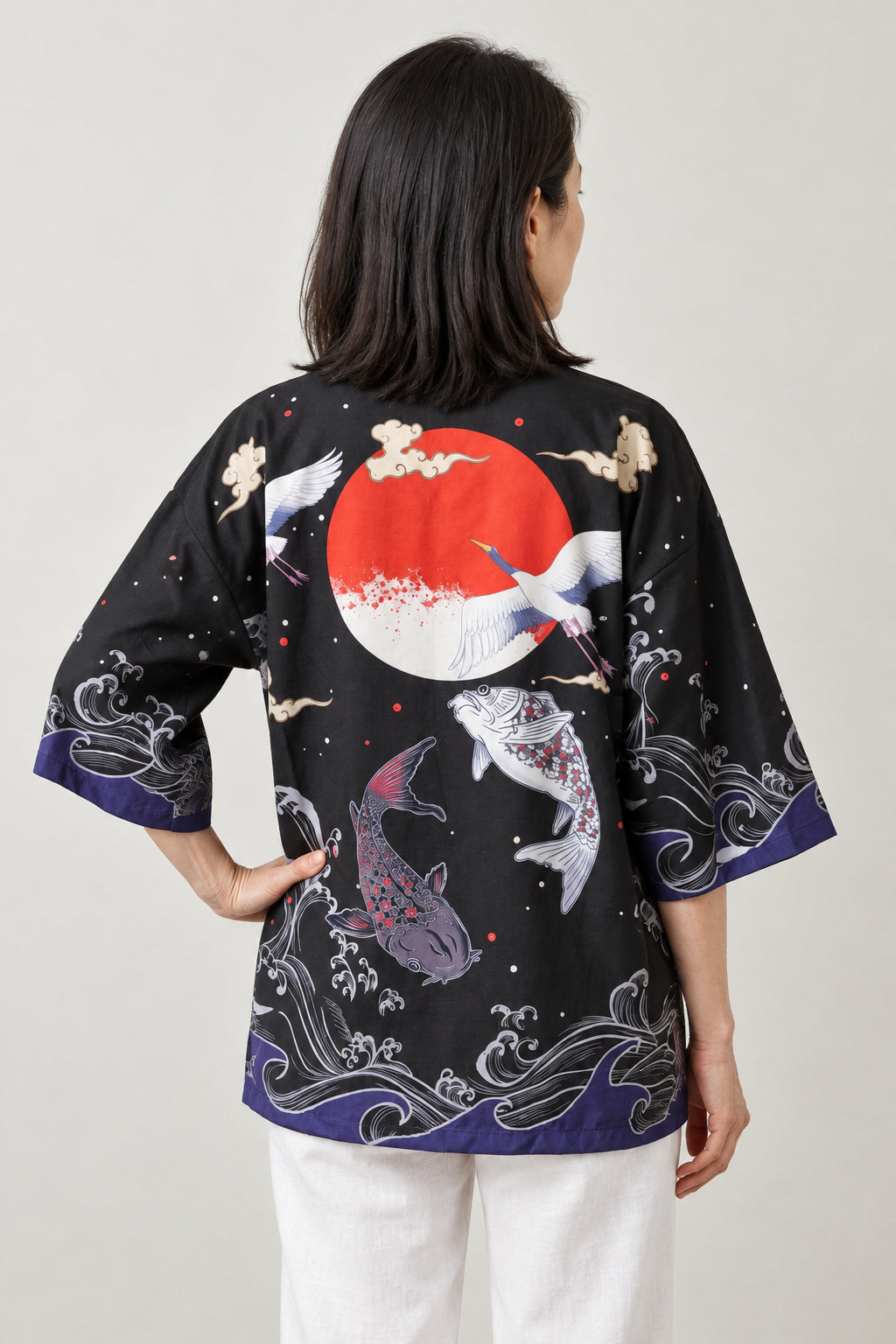 Women's Koi Kimono Jacket 'Murasaki' – back view of black kimono jacket showing koi fish swimming under a red sun