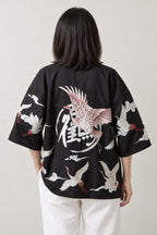 Women's Red Bird Kimono Jacket 'Akane' – back view of black kimono jacket showing the crane and calligraphy crest print