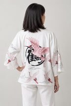 Women's Red Bird Kimono Jacket 'Akane' – back view of white kimono jacket with red crane and crest print