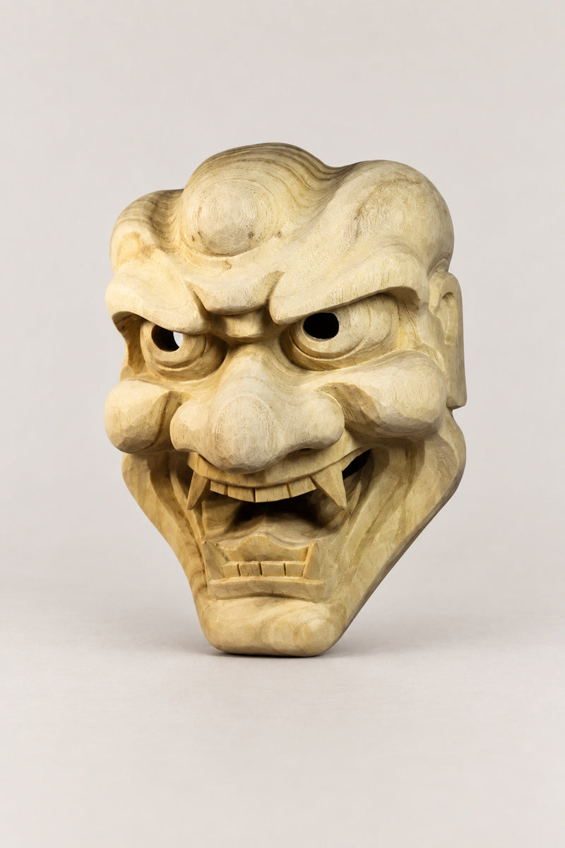 Wooden Japanese Mask 'Ikkoku' – three-quarter view of the carved wooden demon mask showing the depth of the carving