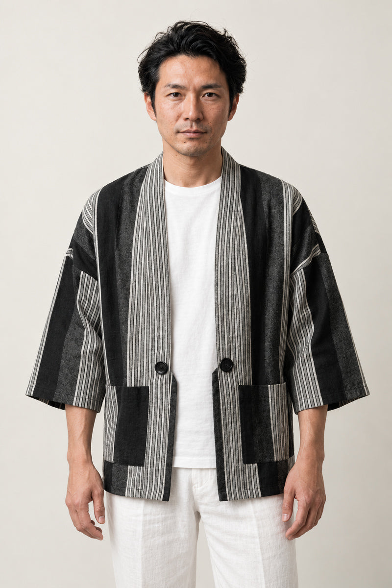 Woven Stripe Kimono Cardigan 'Shimagara' – black and white woven stripe Japanese kimono cardigan with front buttons, unisex haori style jacket, front view on model