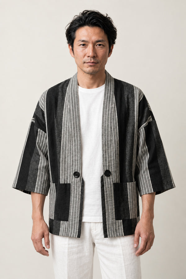 Woven Stripe Kimono Cardigan 'Shimagara' – black and white woven stripe Japanese kimono cardigan with front buttons, unisex haori style jacket, front view on model
