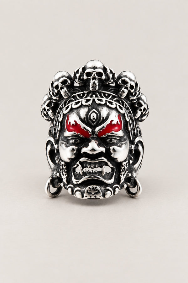 Wrathful Deity Ring 'Myoo' – stainless steel wrathful deity ring with fierce face, skull crown and red eyes, Japanese myoo ring, studio view