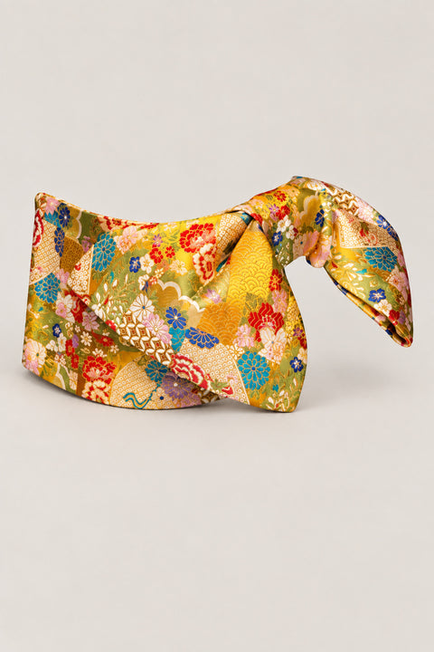 Yellow Obi Belt 'Kogane-iro' – yellow brocade obi with flowers, fans and clouds in red, blue and green, wide pre-tied brocade obi belt with sewn bow for women's kimono or yukata, studio view