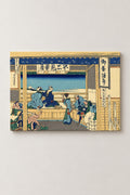 Yoshida Tea House Hokusai Poster 'Tokaido' – Yoshida on the Tokaido, travellers resting in a tea house with Fuji framed from Hokusai's Thirty-six Views of Mount Fuji, ukiyo-e canvas print on wooden frame, Japanese wall art, studio view